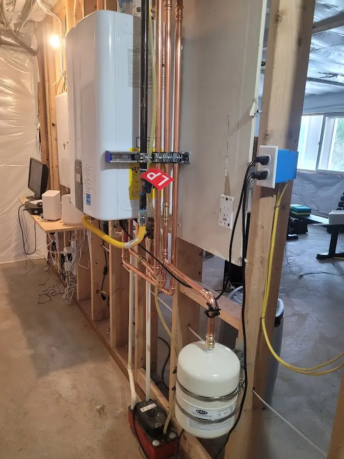 Licensed plumber repairing a kitchen sink in Evanston