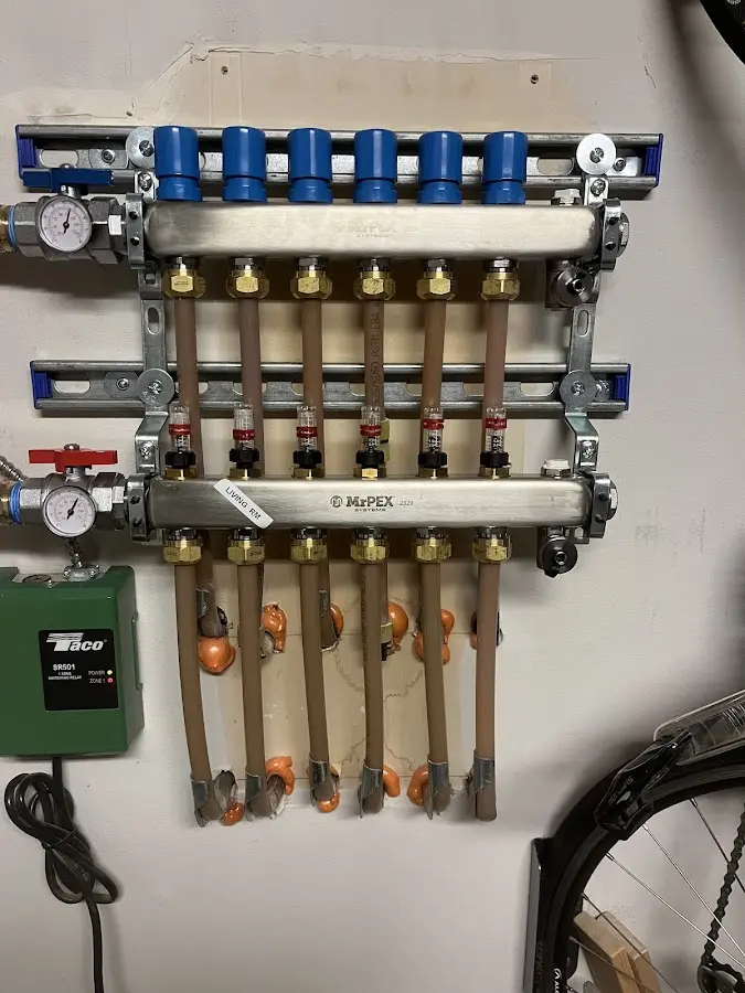 Plumber performing Water Heater Repair at a residential property in Evanston